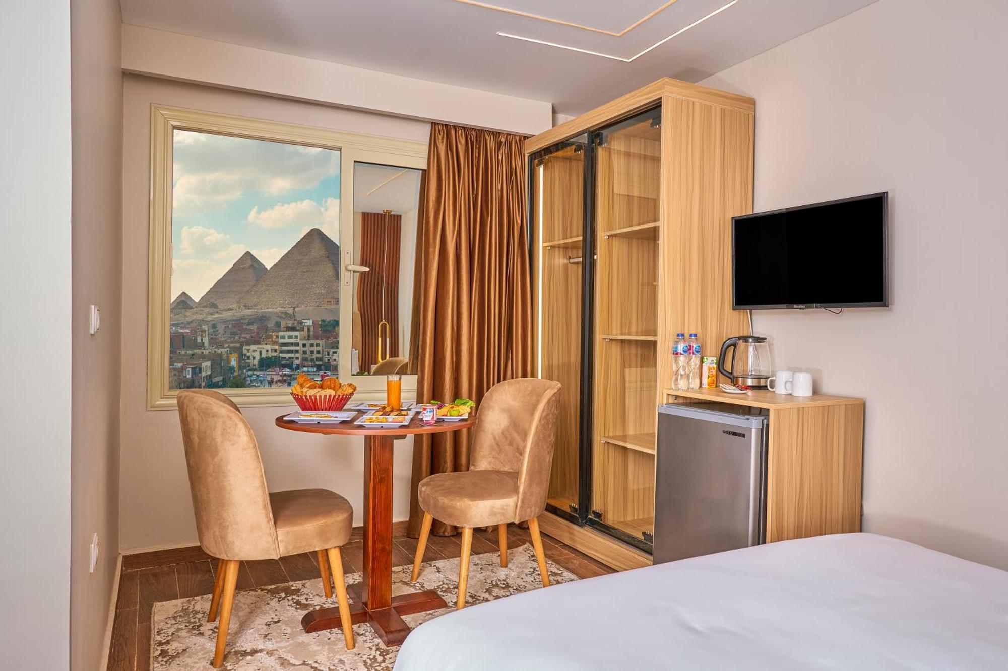 Rotana Pyramids View Hostel Nazlet el-Sisi ภายนอก รูปภาพ